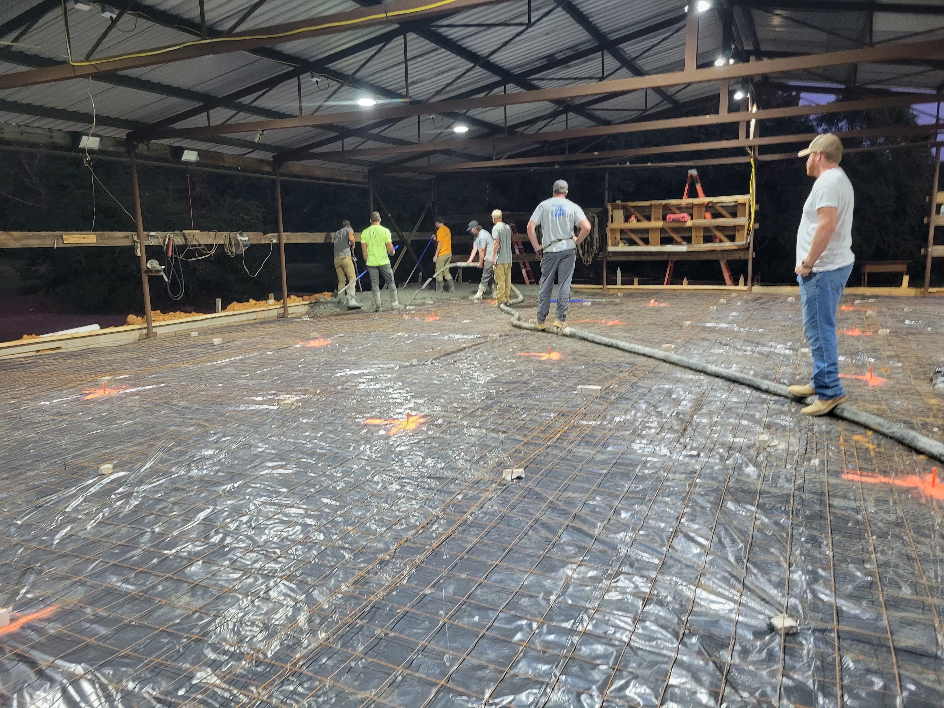 Project Concrete Floor Pour Inside a Large Steel Frame Building image