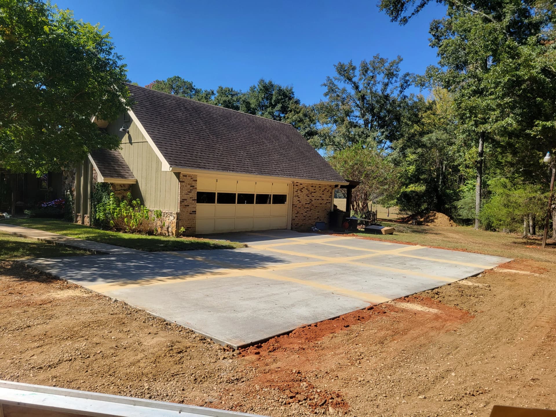 Gallery photos for Cracked Garage Approach Gets a Full Concrete Replacement Plus Greenhouse Pad: Image #1