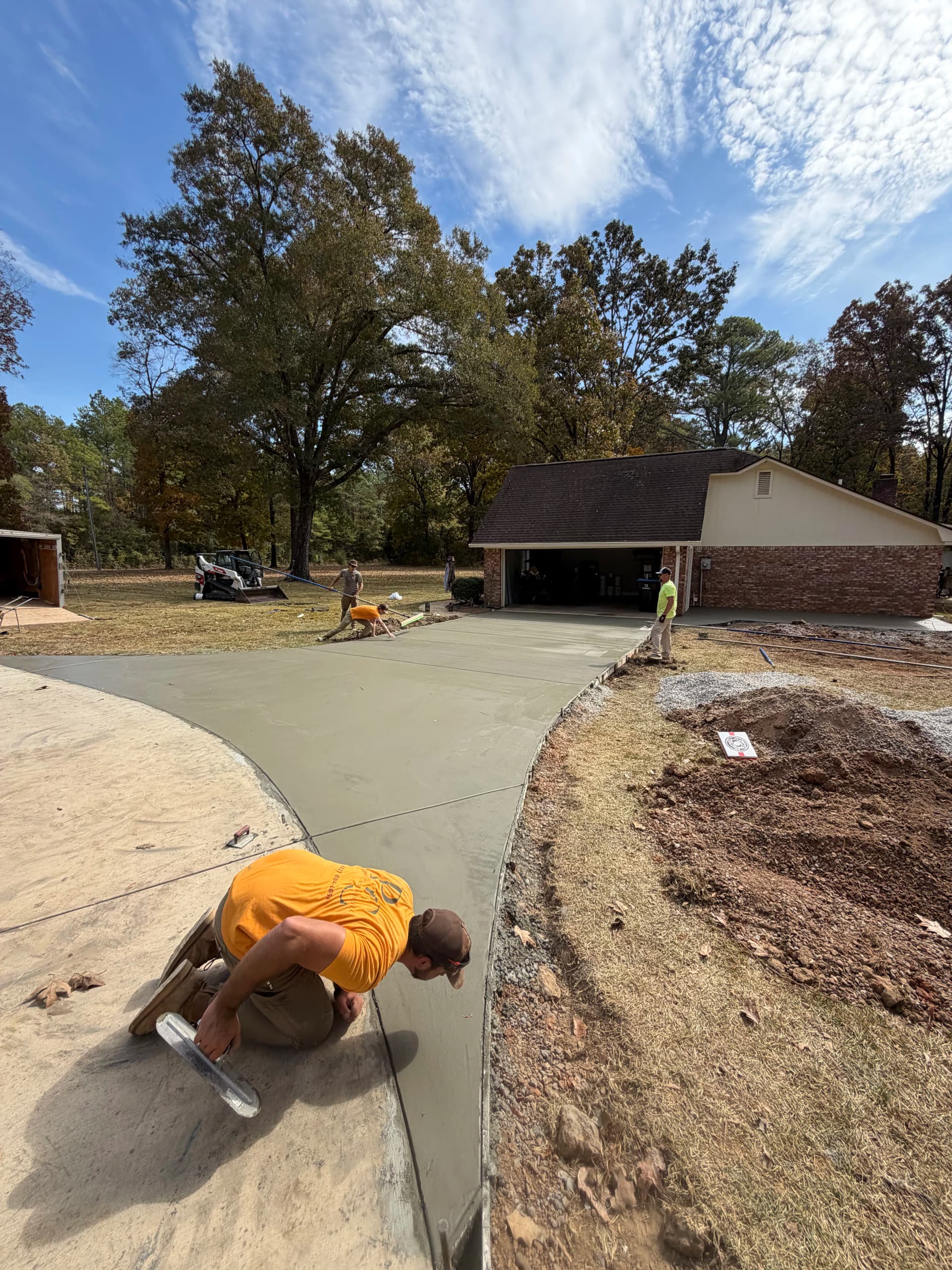 New Concrete Driveway and Porch Pour for a Brick Home image