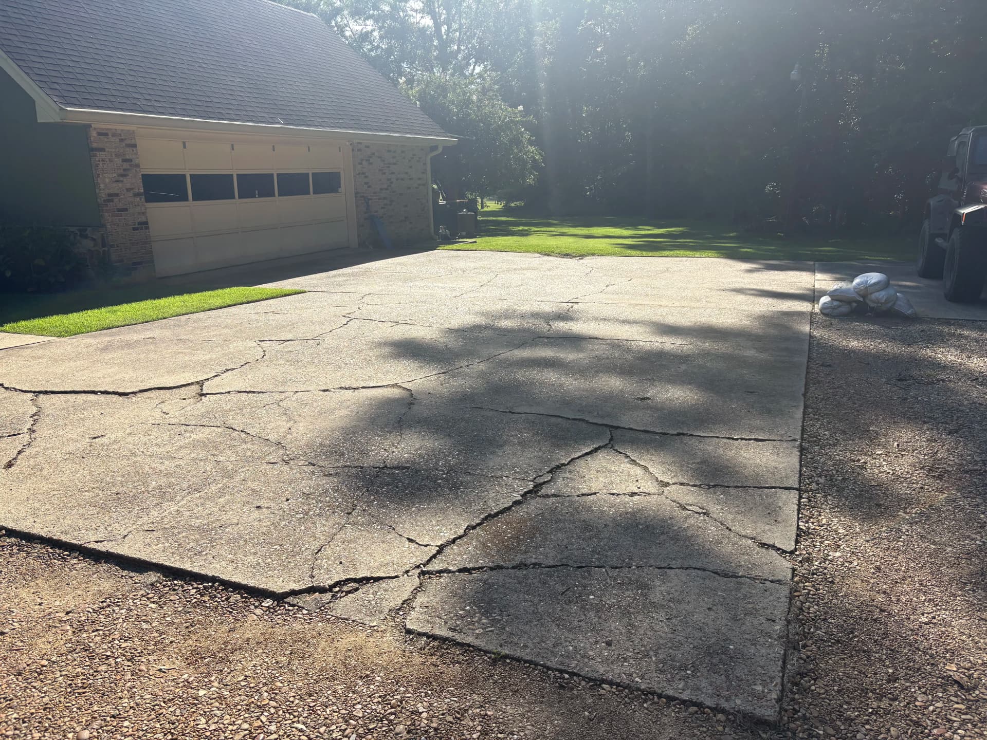 Cracked Garage Approach Gets a Full Concrete Replacement Plus Greenhouse Pad image
